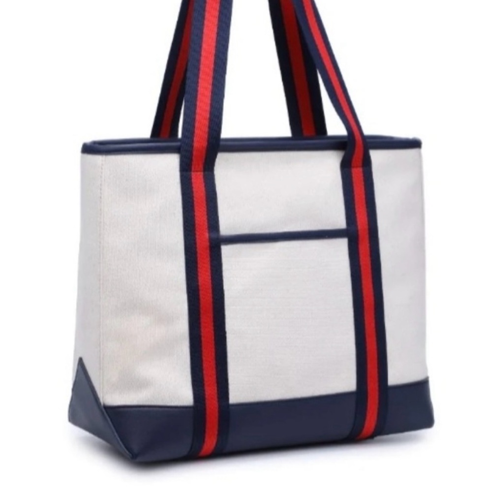 Moda Luxe canvas bag with leather trim, navy and red canvas straps.